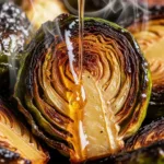 Close up of roasted brussels sprouts showing crispy golden brown caramelized edges
